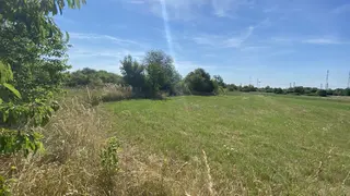 Podíl 1/9 na pozemcích Spořice, okres Chomutov
