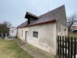 Podíl na RD ve výši 1/3 a na pozemcích ve výši 1/3 v obci Zdeslav u Rakovníka
