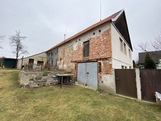 Podíl na RD ve výši 1/3 a na pozemcích ve výši 1/3 v obci Zdeslav u Rakovníka