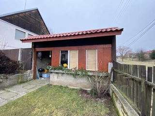 Podíl na RD ve výši 1/3 a na pozemcích ve výši 1/3 v obci Zdeslav u Rakovníka
