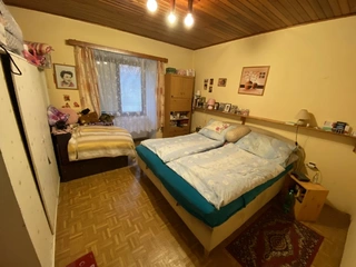 Podíl na RD ve výši 1/3 a na pozemcích ve výši 1/3 v obci Zdeslav u Rakovníka