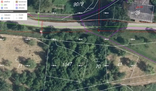 Výjimečný stavební pozemek ve svahu s panoramatickým výhledem – Bušín