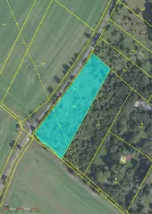 Id. spoluvlastnický podíl 1/18 na pozemcích v k.ú. Újezd nad Lesy o celkové výměře 5647 m2