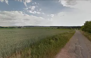Spoluvlastnický podíl id. 1/2 pozemků Lom, okres Tábor
