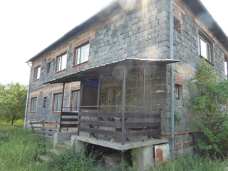Spoluvlastnický podíl ve výši id. 2/6 RD Brusné
